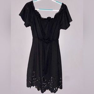 Off the shoulder, short black dress